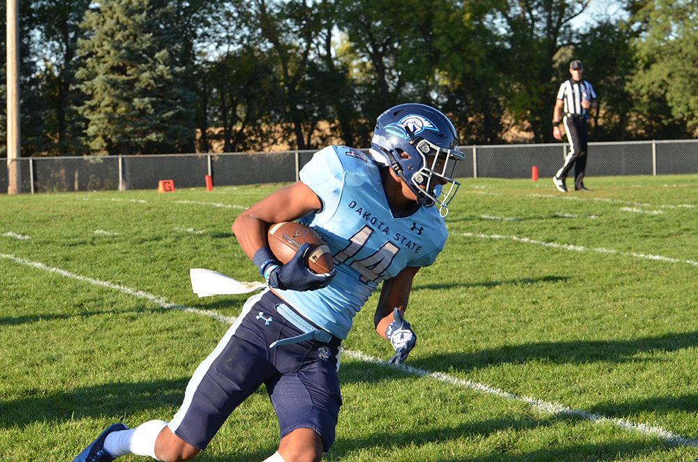DSU football's Dajshon Keel running with the football 