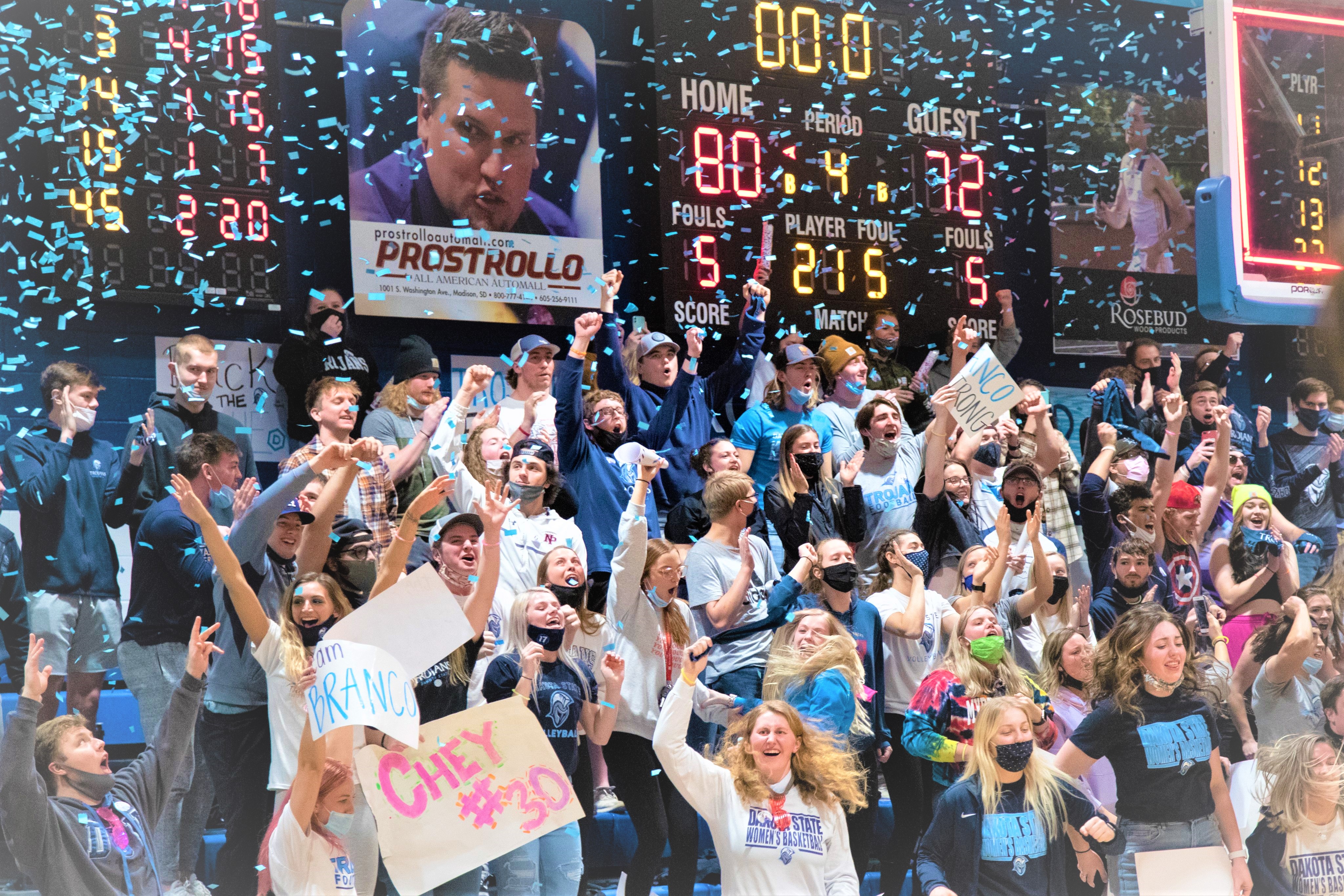 DSU student section celebrating a Trojan win