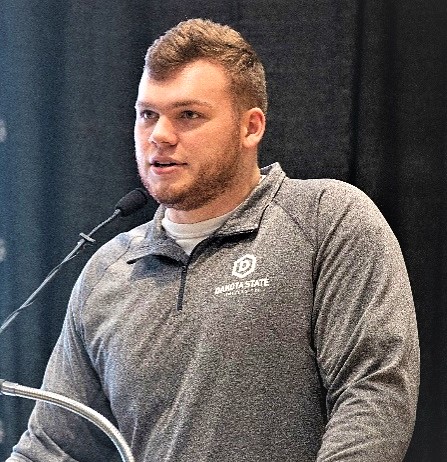 DSU football athlete Cody Brown giving a speech